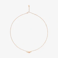 Collana nodo in oro rosa con diamante